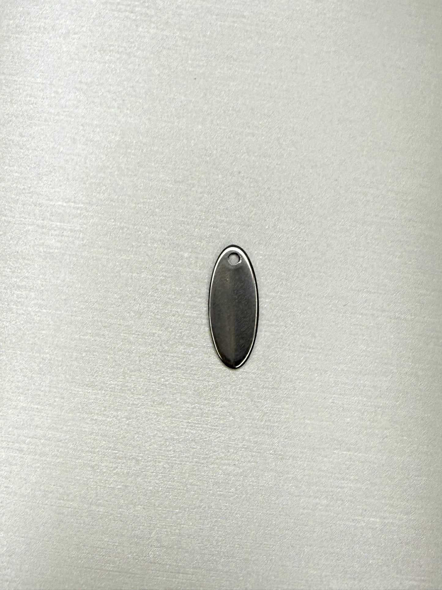 Token CM Oval Plate